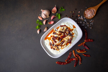 Traditional Turkish and Greek Meze with chili peppers. Turkish Appetizer Atom with yogurt. Turkish atom meze