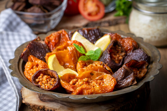 Dried eggplant stuffed and dried pepper stuffed with rice, tomato and olive oil known as dolma. (Turkish name; kuru biber dolmasi, kuru patlican dolmasi)