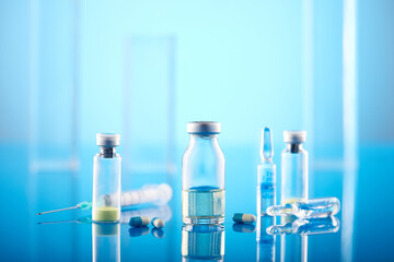 Vaccines and syringe in a laboratory