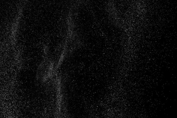 Distressed white grainy texture. Dust overlay textured. Grain noise particles. Snow effect. Rusted black background. Vector illustration, EPS 10.   