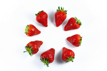Composition of fresh strawberries on a white background.