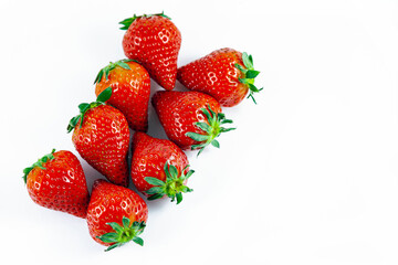 Composition of fresh strawberries on a white background.