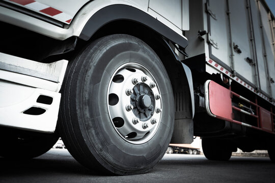 Front of Truck Wheels Tires. Lorry Tyres Rubber. Freight Trucks Transport.