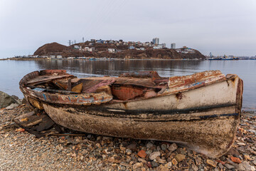 Old wooden fishing boat on the sea. North Korean fishing schooners