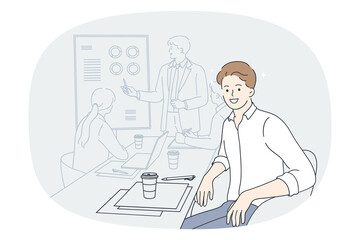 Smiling man employee at team meeting with coach or presenter in office. Happy male worker sit at desk with colleagues having briefing with group leader or boss. Flat vector illustration. 