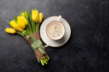 Yellow tulip flowers bouquet and coffee