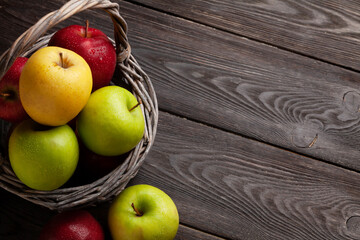 Colorful ripe apple fruits in basket