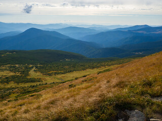 Sunny autumn day in the Ukrainian Carpathian mountains. Picturesque mountains landscape panorama view of the Chornogora ridge. View from the highest Ukrainian Carpathian mount Hoverla Ukraine