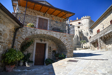 A narrow street among the old stone houses of Rocca Cilento, town in Salerno province, Italy.