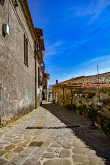 A narrow street among the old stone houses of Rocca Cilento, town in Salerno province, Italy.
