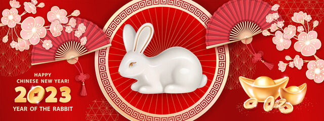 Rabbit is a symbol of the 2023 Chinese New Year. Horizontal banner with rabbit, realistic gold ingots Yuan Bao, coins, hand fan and sakura flowers on red background. The wish of wealth, monetary luck - 492505946