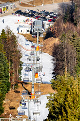 Chairs at ski-lift chair at Salamandra resort in winter season.