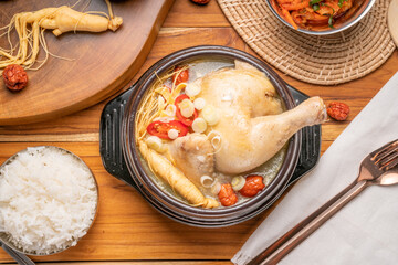 Ginseng chicken soup or Samgyetang, Koreans traditional food chicken stuffed with rice, ginsenga popular stamina food in summer.