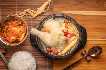 Ginseng chicken soup or Samgyetang, Koreans traditional food chicken stuffed with rice, ginsenga popular stamina food in summer.