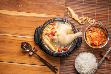 Ginseng chicken soup or Samgyetang, Koreans traditional food chicken stuffed with rice, ginsenga popular stamina food in summer.