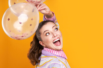 Young nice woman isolated over yellow background