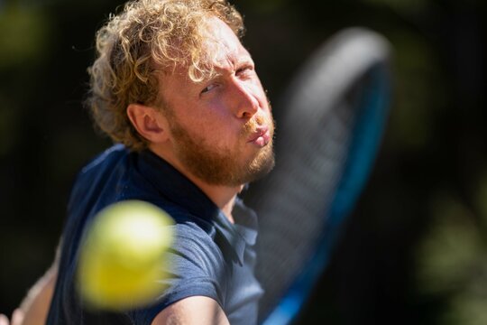 close up of an Amateur tennis player, playing tennis in Melbourne, Australia in aummer