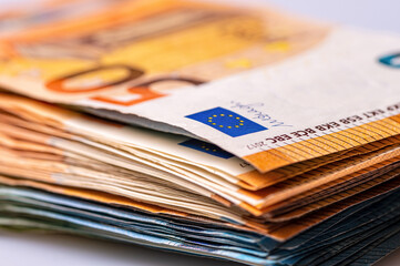 fifty and twenty euro banknotes close-up. Cash background