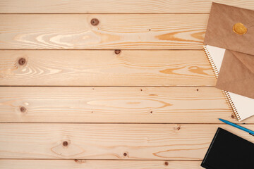 Letters and Office Supplies on Table Desk. Top View