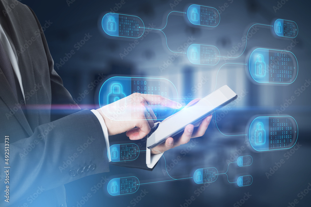 Aufkleber Close up of male hand pointing at tablet with abstract big data and security nodes hologram on blurry background. Technology, web safety and programming concept. Double exposure.
