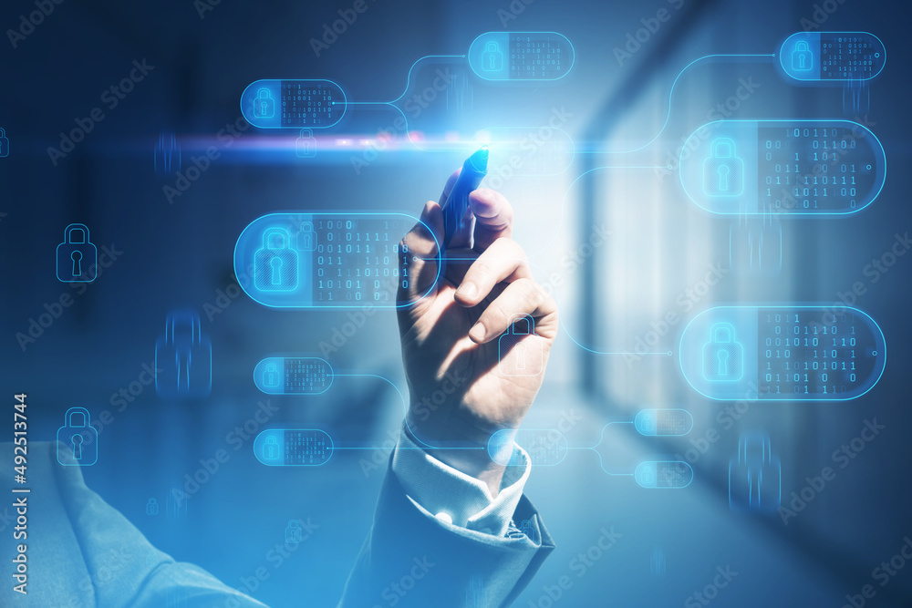 Poster Close up of hand with pen pointing at abstract big data and security nodes hologram on blurry background. Technology, web safety and programming concept. Double exposure.