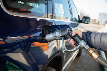 Fueling up the car at the gas station, road trip, driving, expensive, gas pump, gasoline, gas...