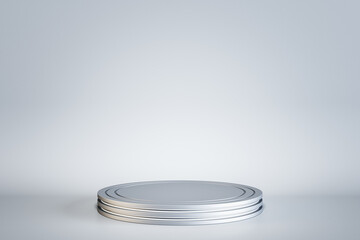Empty round pedestal on white concrete wall background. Mock up place. 3D Rendering.