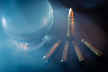 A beam of light from the oracle crystal ball illuminates the assault rifle bullet. There are rifle...