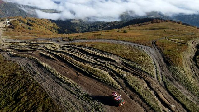 aerial view of trail road to the top of carpathian mountains