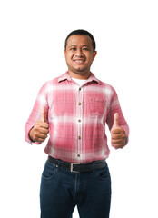 A young engineer wearing a red long sleeve shirt and jeans, standing straight, thumbs up on a white background with clipping path.