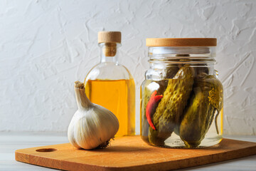 Pickled cucumbers in a jar.