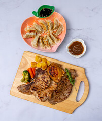 Steaks and Gyoza Mixed Dishes