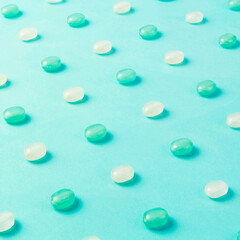 candies on turquoise background