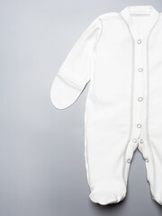 a set of children's wearable white overalls for newborns and small ages. on release