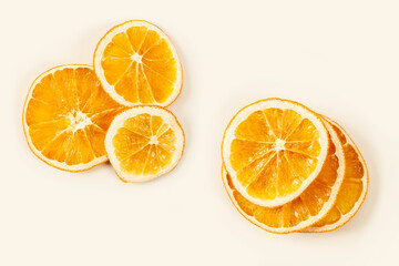 dry orange slices on a white background