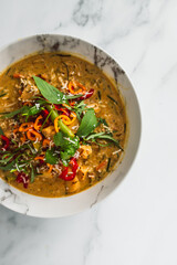 vegan thai vegetable curry with fresh chili and herbs, healthy plant-based food