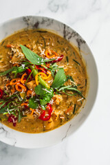 vegan thai vegetable curry with fresh chili and herbs, healthy plant-based food