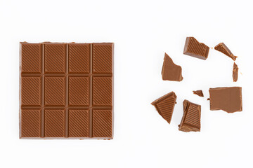 chocolate bars and pieces on a white background