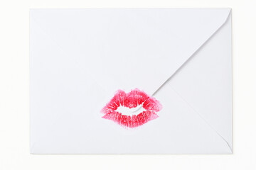 trace of red lipstick lip on a white background
