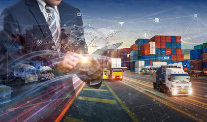 Smart logistics and transportation. Concept, Businessman use tablet and analyzing on logistic...