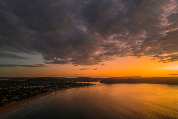 Aerial sunrise seascape with  low clouds