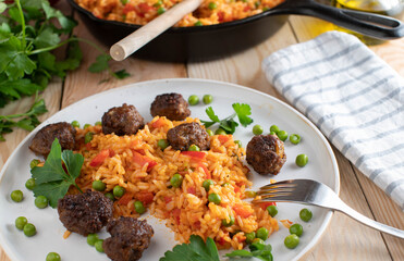 Rice with vegetables and meatballs