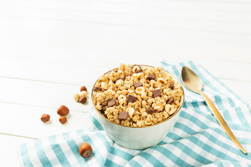 plate of chocolate granola on white table