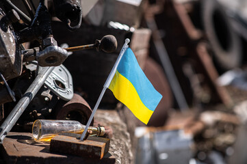 Ukrainian flag against the background of destruction. There is no war. Support for Ukraine