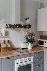 Scandinavian kitchen. New year kitchen. Kitchen interior. Modern interior. Christmas decoration at home. 
