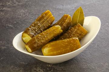 Marinated pickled cucumbers in the bowl