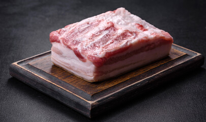 Close-up fat Salted lard homemade lard on a wooden board