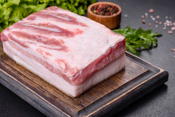 Close-up fat Salted lard homemade lard on a wooden board