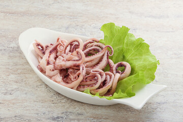 Marinated squid tentacles in the bowl