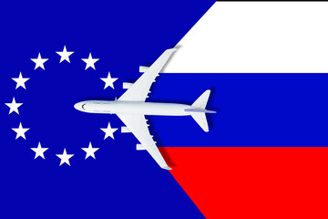 Fototapeta premium no travel by plane closed sky because of war conflict between Russian and Ukraine toy plane with russian flag